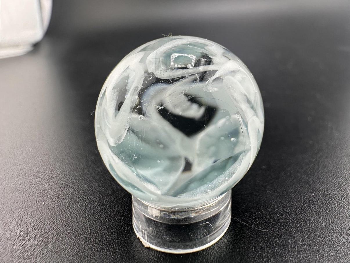 SBJ Glass Marble - Simple White Wisp .75" beautifully crafted with delicate white wisps in clear glass.