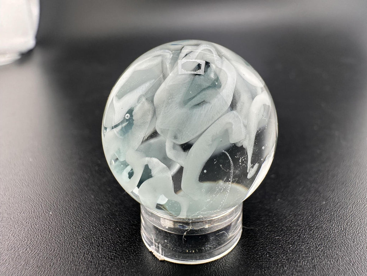 SBJ Glass Marble - Simple White Wisp .75" showcasing delicate white wisps in clear borosilicate glass.