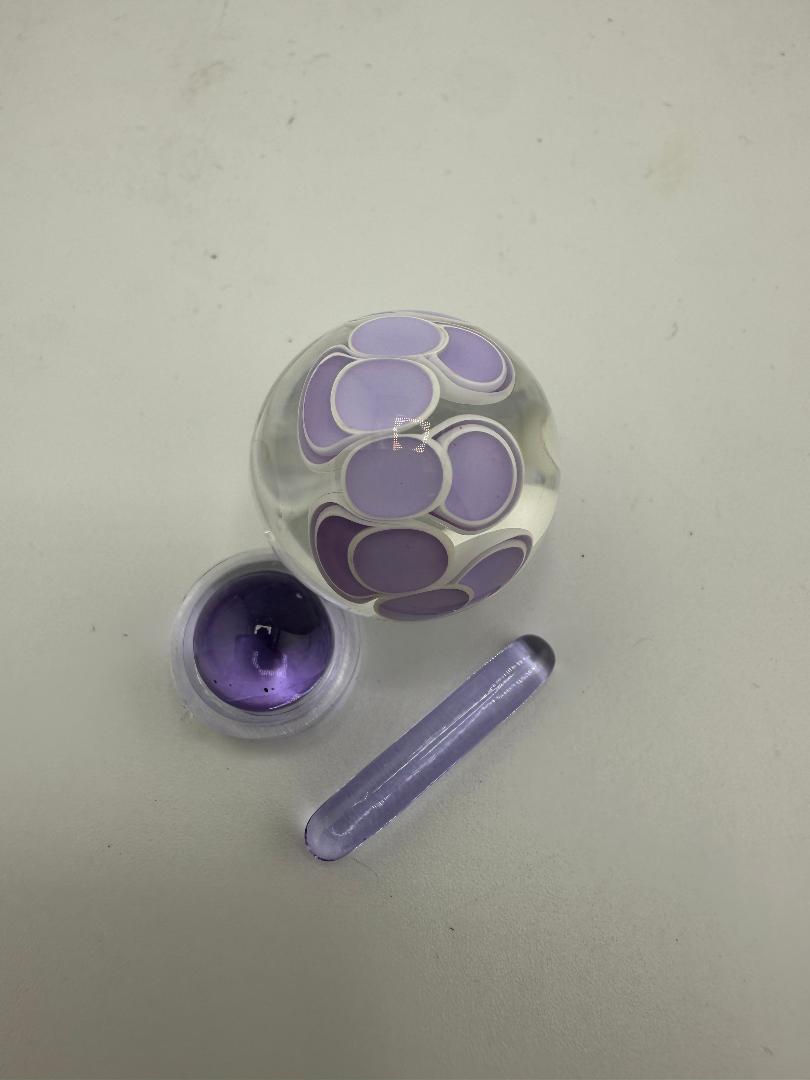 SBJ Glass Slurper Set featuring a purple patterned bowl, dab tool, and silicone container.