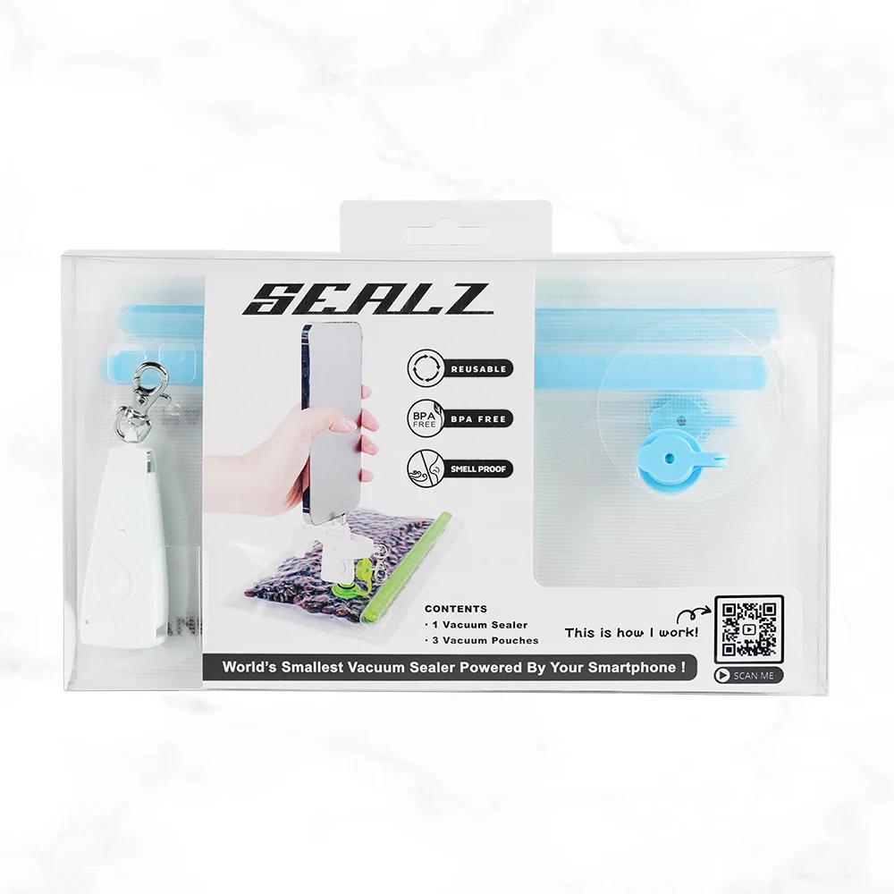 SEALZ Essentials Vaccuum Sealing Kit packaging featuring a vacuum sealer and storage pouches for odor-proof storage.