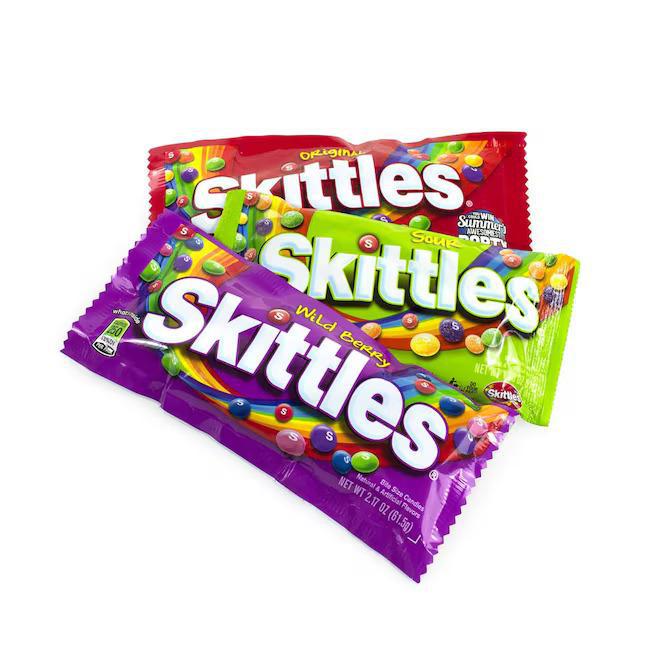 Three packs of Skittles including Original, Sour, and Wild Berry flavors with vibrant packaging.
