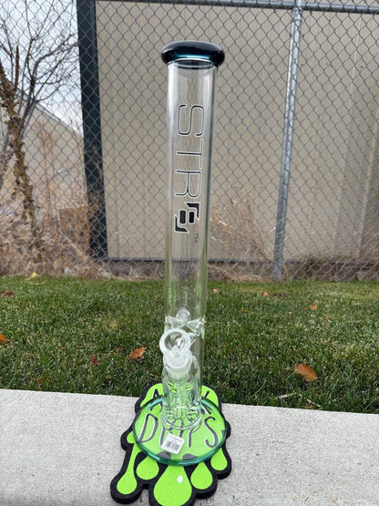 Str8 Glass 18" Straight Tube 14mm 45° displayed outdoors on a green mat with unique design.
