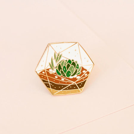 Occasionalish Enamel Pin - Succulent Terrarium featuring a colorful succulent arrangement in a faceted glass terrarium.