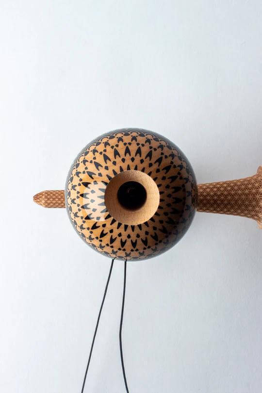 Top view of Sweets Kendama Boo Johnson Sacred model, showcasing intricate design and beech wood finish.