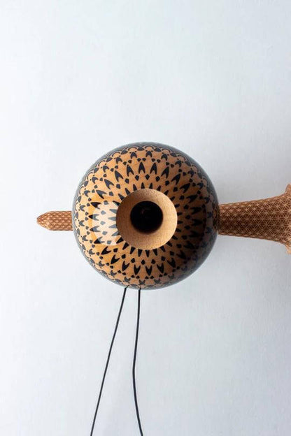 Top view of Sweets Kendama Boo Johnson Sacred model, showcasing intricate design and beech wood finish.