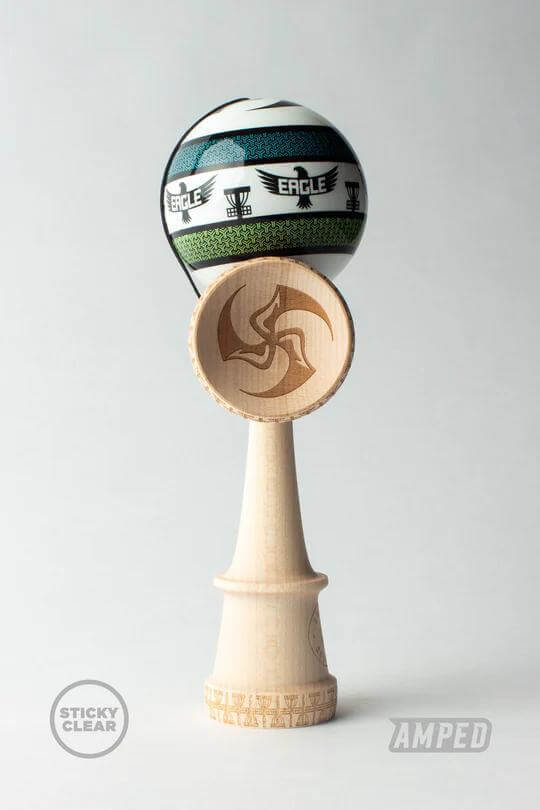 Sweets Kendama Eagle McMahon Amped model with KEN Amped shape and engravings, showcasing a colorful design and maple wood base.