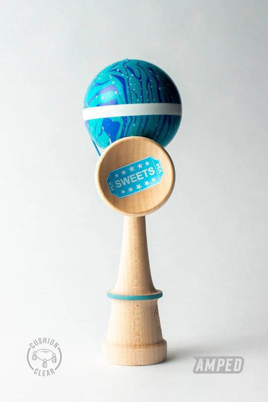 Sweets Kendama Eywa with blue marble design and Sweets logo, crafted with Amped shape for improved playability.
