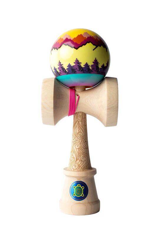 Sweets Kendama Joshua 'Flow' Grove Pro featuring vibrant mountain design and wooden base.