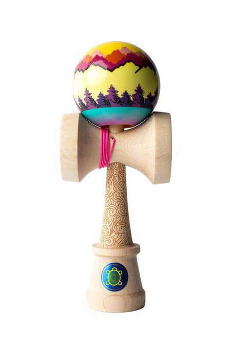 Sweets Kendama Joshua 'Flow' Grove Pro featuring vibrant mountain design and wooden base.