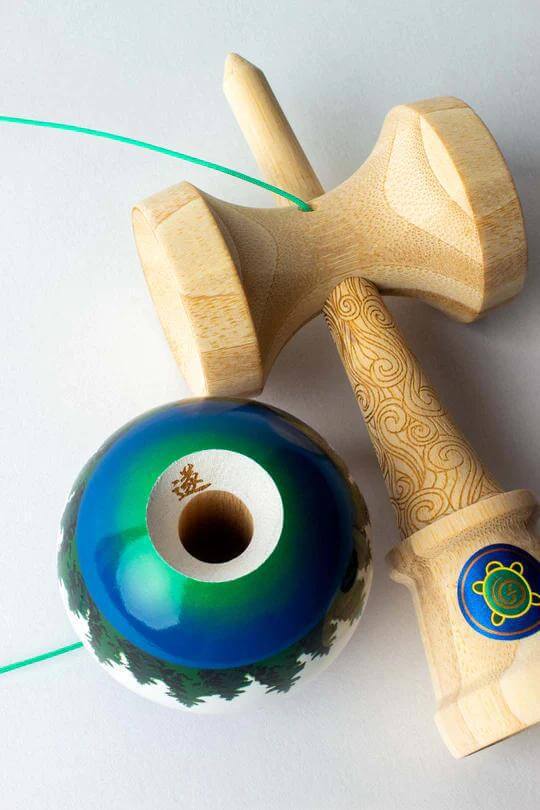 Sweets Kendama Joshua 'Flow' Grove Pro featuring unique legend shape and vibrant multi-color design.
