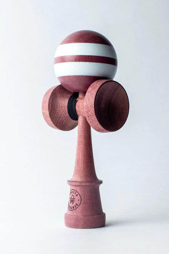 Sweets Kendama Purpleheart with hand-painted TAMA, featuring Amped shape and engraved logo, perfect for skilled play.