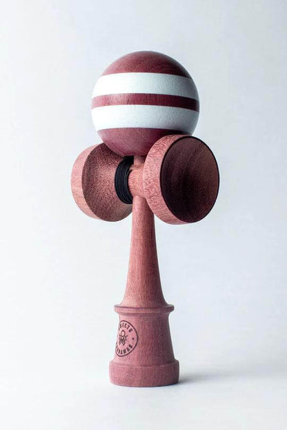 Sweets Kendama Purpleheart with hand-painted TAMA, featuring Amped shape and engraved logo, perfect for skilled play.