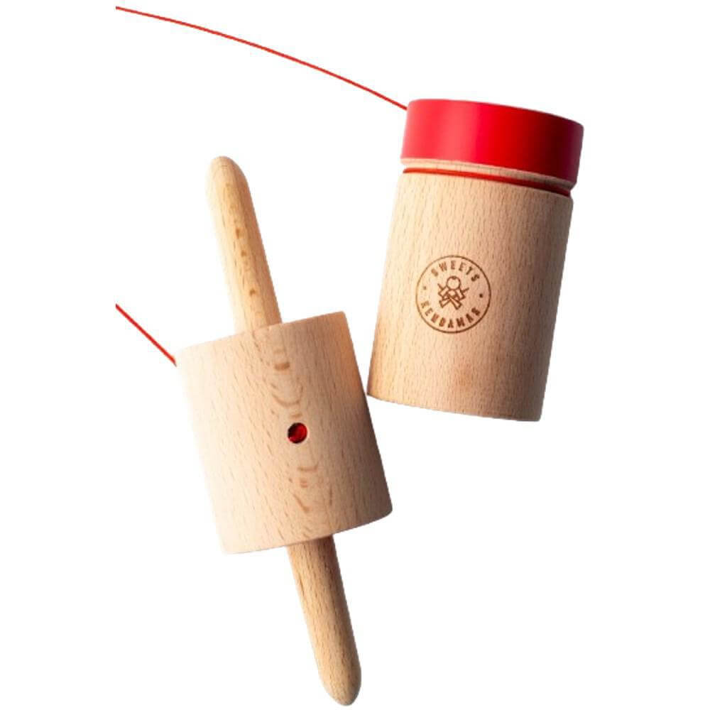 Sweets Kendama Rolling Pin toy featuring wood design and rubber-painted areas for stalling and tracking.