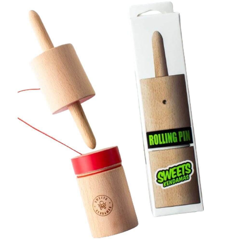 Sweets Kendama Rolling Pin skill toy with rubber painted areas for enhanced stalling and tracking, packaged in box.