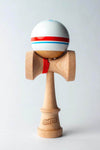 Sweets Kendama Sport Stripe in Sticky Clear finish, showcasing a wooden base and striped ball design.