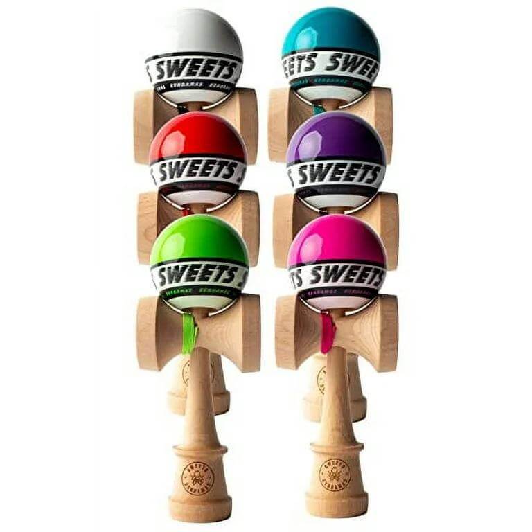 Sweets Kendama Starter Sticky Clear set featuring colorful kendama toys on a wooden base.