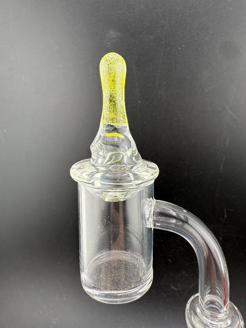 Taco Glass Directional Cap showcasing a clear banger with a yellow tip for enhanced airflow control.