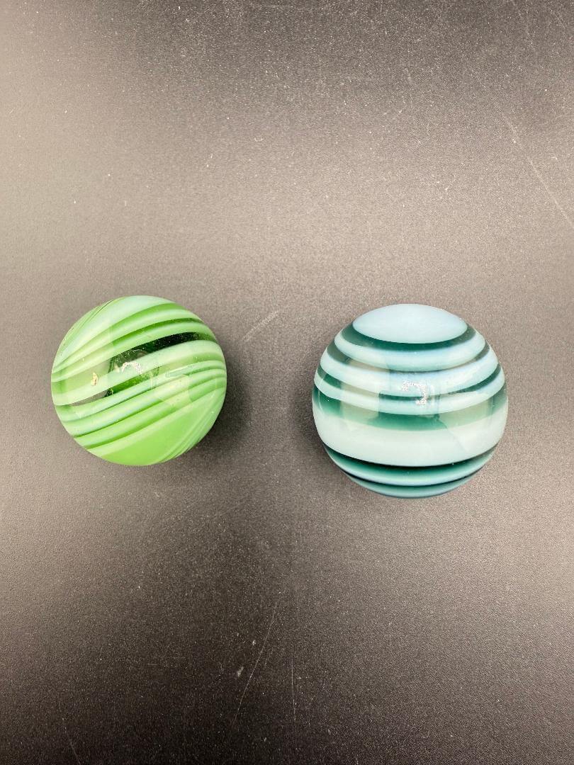 Taco Glass Marble - 2 Tone Spiral 1" showcasing green and blue spiral designs in a 1-inch size, handcrafted quality.