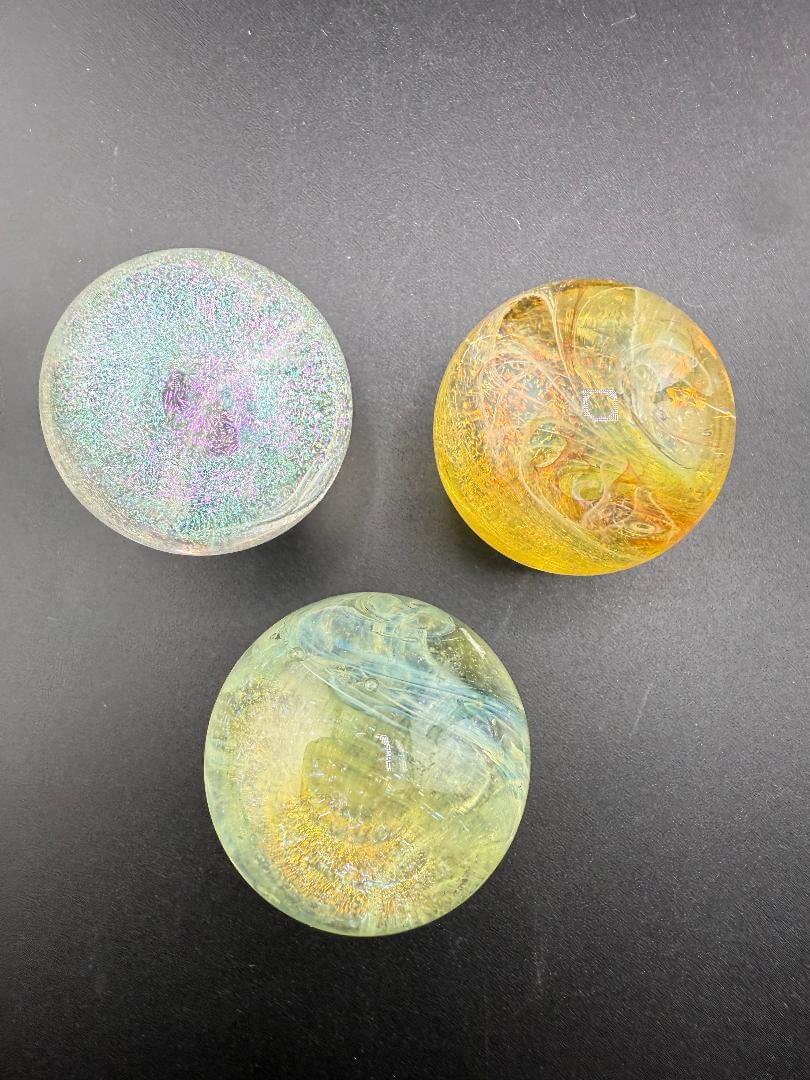 Taco Glass Marble - Fumed Dichro 1.1" in three accent colors: Green, Orange, and Clear with vibrant dichroic effects.