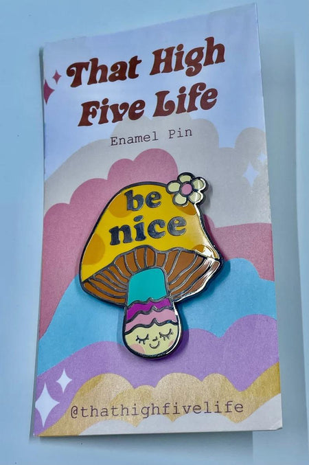 That High Five Life Enamel Pin-Be Nice on colorful backing featuring mushroom design and positive message.