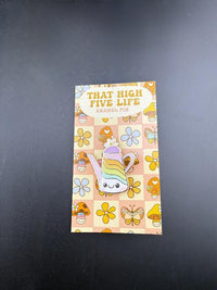 That High Five Life Enamel Pin - Teapot displayed on a colorful backing with flowers and hearts.
