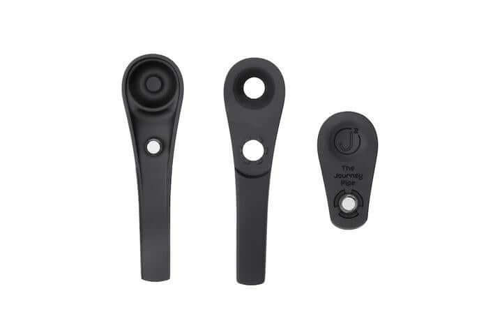 Three black components of The Journey Pipe J2, designed for durability and innovative use.