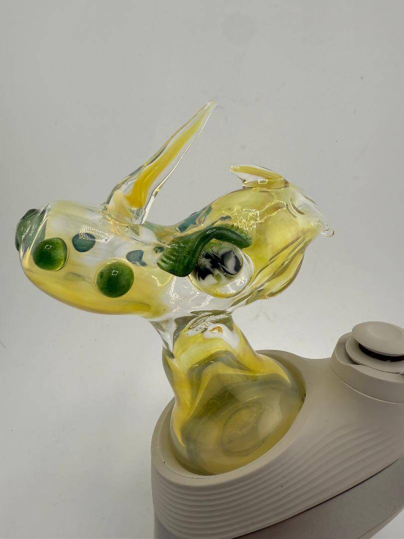 Handcrafted Tuck Glass Dinosaur Puffco Peak Pro replacement glass with vibrant yellow and green details.