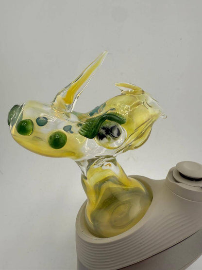 Handcrafted Tuck Glass Dinosaur Puffco Peak Pro replacement glass with vibrant yellow and green details.