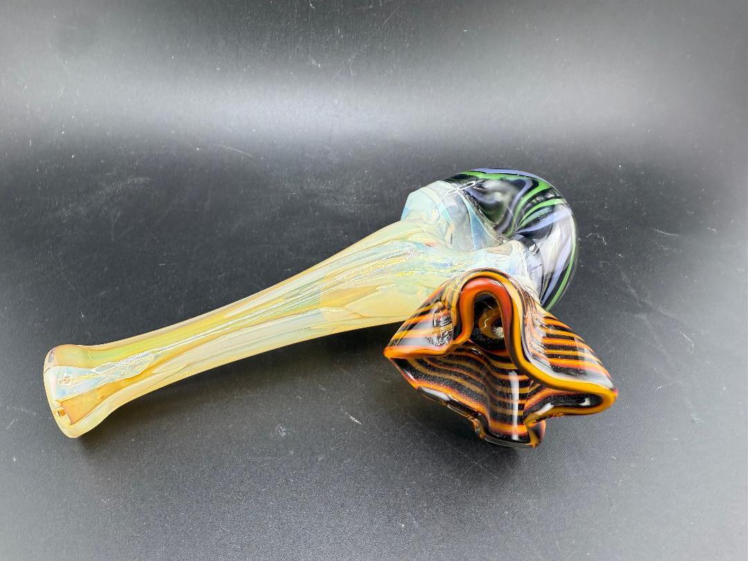 Tuck Glass Hand Pipe - Fumed w/ Wig Wag Cap & Floral Attachment showcasing a fumed finish and colorful design.