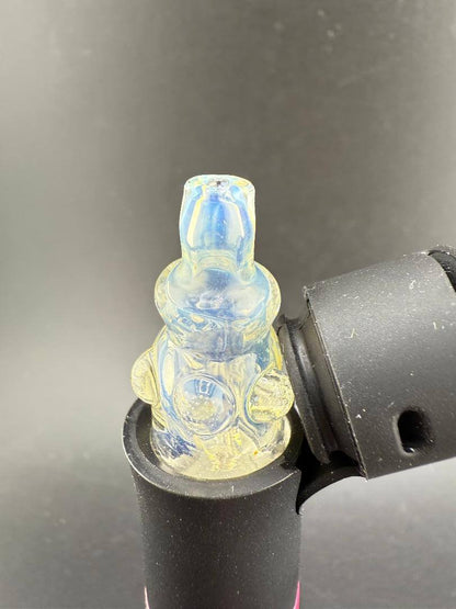 Tuck Glass Puffco Pivot Glass Replacement Top in vibrant blue and yellow, securely fitting on a Puffco Peak Pro.