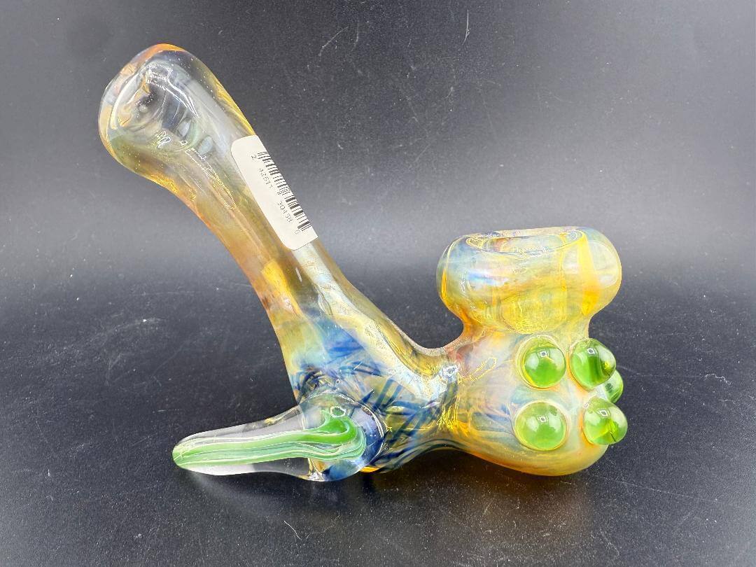 Tuck Glass Sherlock Pipe - Fumed w/ Green Dots featuring a vibrant design and classic curve for optimal airflow.