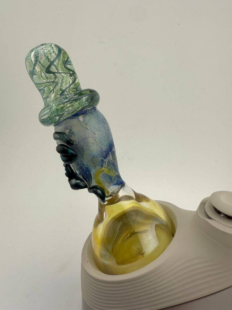 Tuck Glass Top Hat Man replacement glass for Puffco Peak Pro, featuring playful design and vibrant colors.