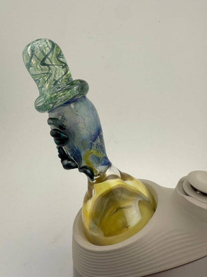 Tuck Glass Top Hat Man replacement glass for Puffco Peak Pro, featuring playful design and vibrant colors.