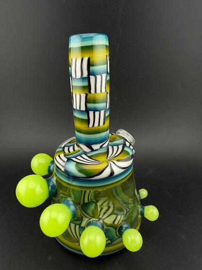 Twisted Images Glass Chip Stack Jammer Rig 14mm 45° with unique green and black pattern and smooth design.