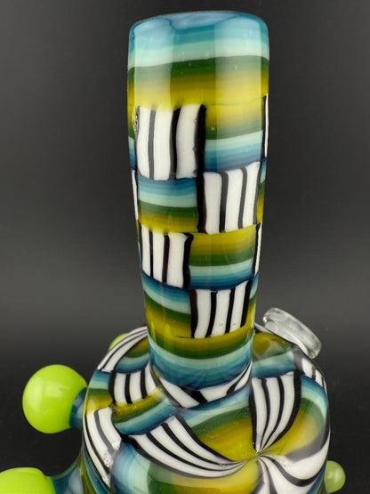 Twisted Images Glass Chip Stack Jammer Rig 14mm 45° with green, black, and white chip stack design showcasing artistic flair.