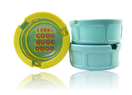 Ugly House 3" Ashtray - I Feel Good displayed with vibrant colors and playful text on silicone-lined design.