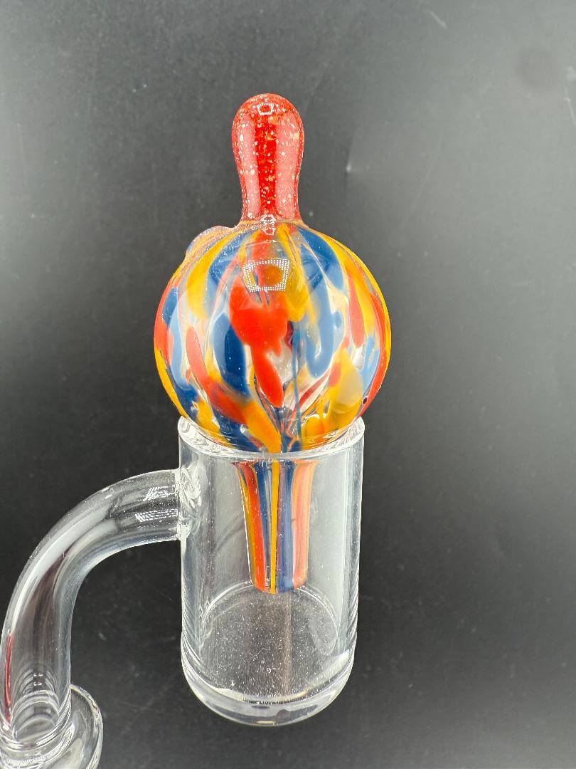Unknown Artist Bubble Cap - 30mm rainbow Frit with vibrant colors and smooth airflow control.