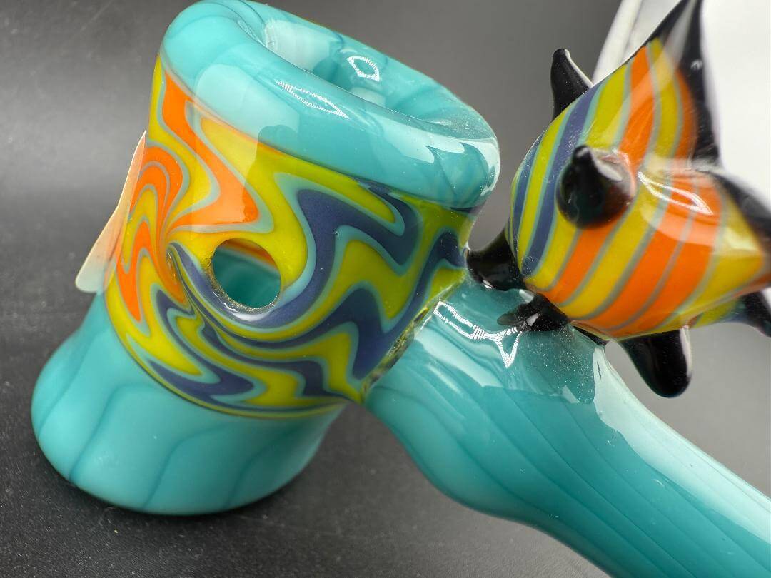 Unknown Artist Hammer Pipe - Teal  w/ Yellow & Blue Wig Wag sections close-up showing vibrant colors and unique design.