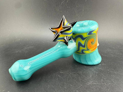 Unknown Artist Hammer Pipe - Teal  w/ Yellow & Blue Wig Wag sections with striking star accent and vibrant design.