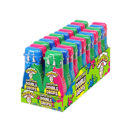 Display of Warheads Super Sour Double Drops in vibrant packaging for dual-flavor liquid sour candy.