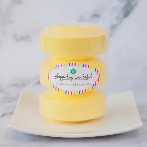 Whipped Up Wonderful Awake Shower Steamie 3pc stacked on a white plate, showcasing vibrant colors and fresh design.