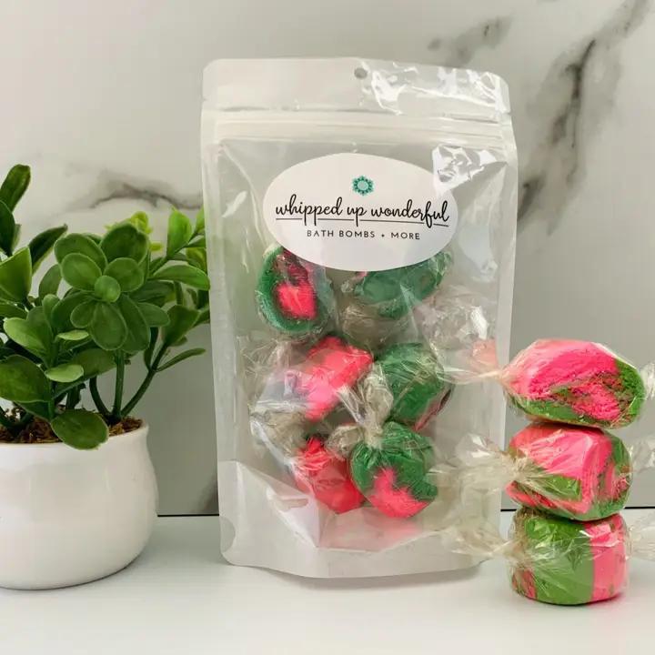 Whipped Up Wonderful Watermelon Bath Taffy in a clear package with colorful bubble bath treats.