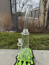 Wildfire Productions Castle Rig 14mm 90° displayed on a colorful mat, showcasing its unique glass art design.