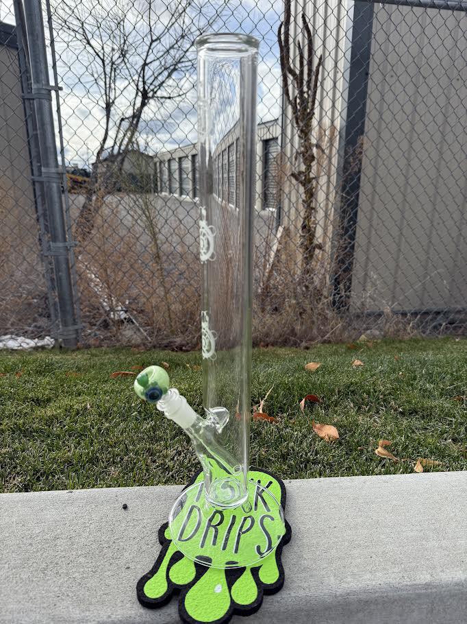 Wildfire Productions Straight Tube Turtle displayed on green drip mat against a background of fencing and nature.