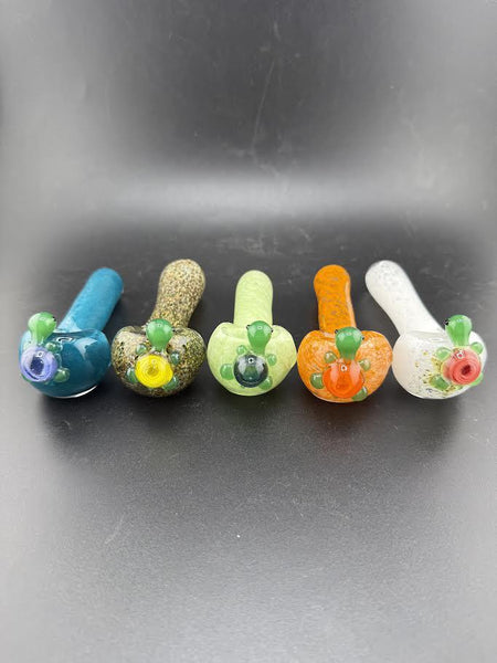 Wildfire Productions Turtle Pipe collection showcasing vibrant handblown glass designs in various colors.