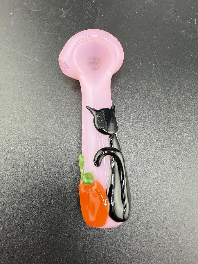 Wildfire Productions Black Cat Pipe showcasing a whimsical black cat design on a pink glass pipe.