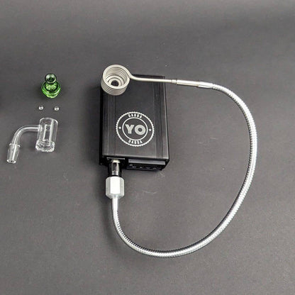 Yo Dabba Dabba Flex Coil Enail 25mm Kit with control box, quartz nail, and accessories on a black surface.